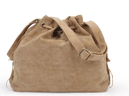 Bolso bucket de flecos color albaricoque