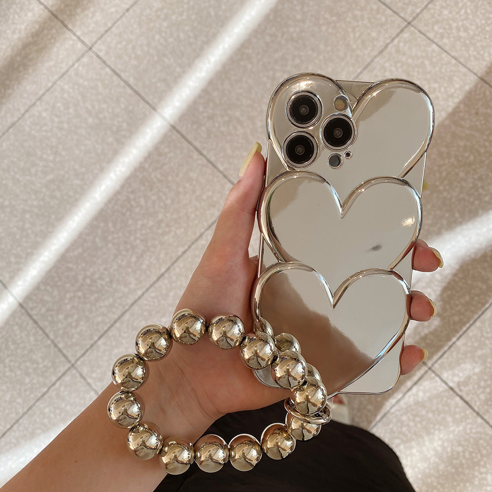 Funda Mirror Hearts – Edición Luxe con Asa de Perlas Metálicas